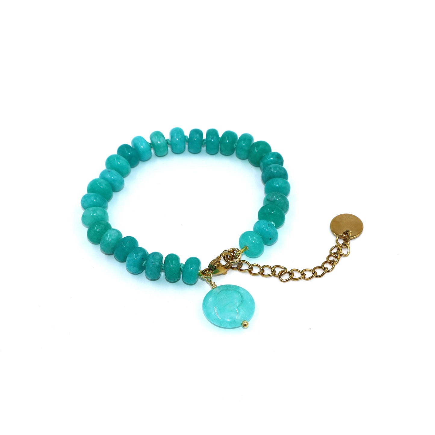 Turquoise beaded bracelet with a gold chain and turquoise charm on a white background